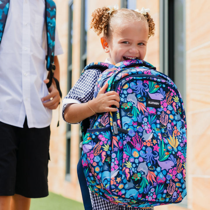 Sealife Midsize Kids Backpack lifestyle image child wearing, lightweight waterproof school bag for boys and girls