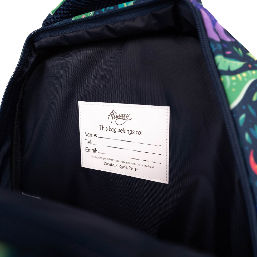 Dinosaurs Midsize Kids Backpack inside view with name label and easy-clean waterproof coated interior lining, durable kids school bag