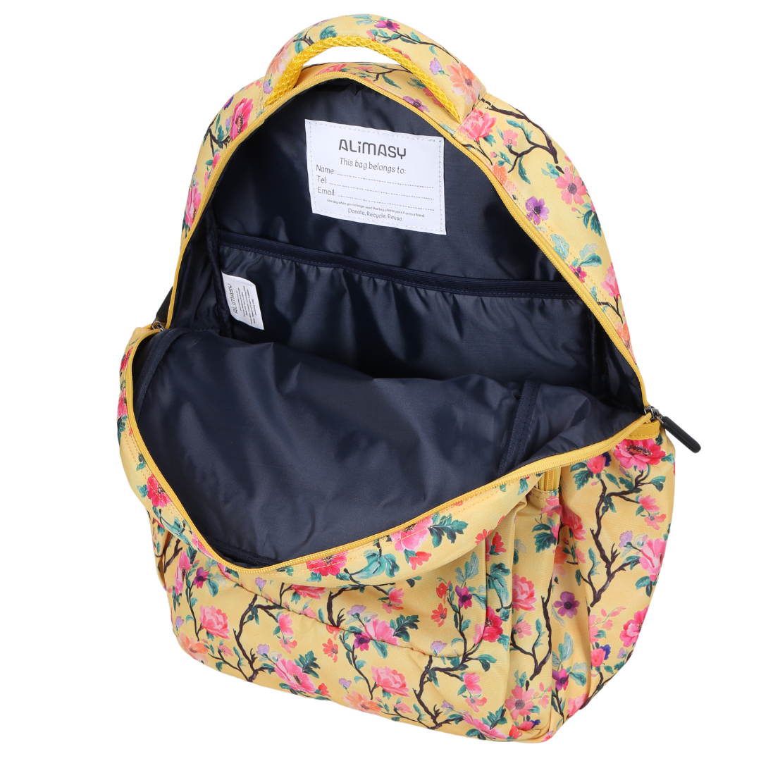 Close-up of Yellow Floral Large School Backpack. Easy clean waterproof lining and durable fabric