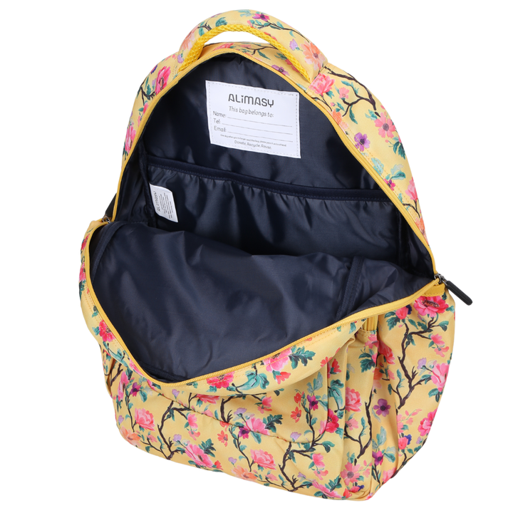 Close-up of Yellow Floral Large School Backpack. Easy clean waterproof lining and durable fabric