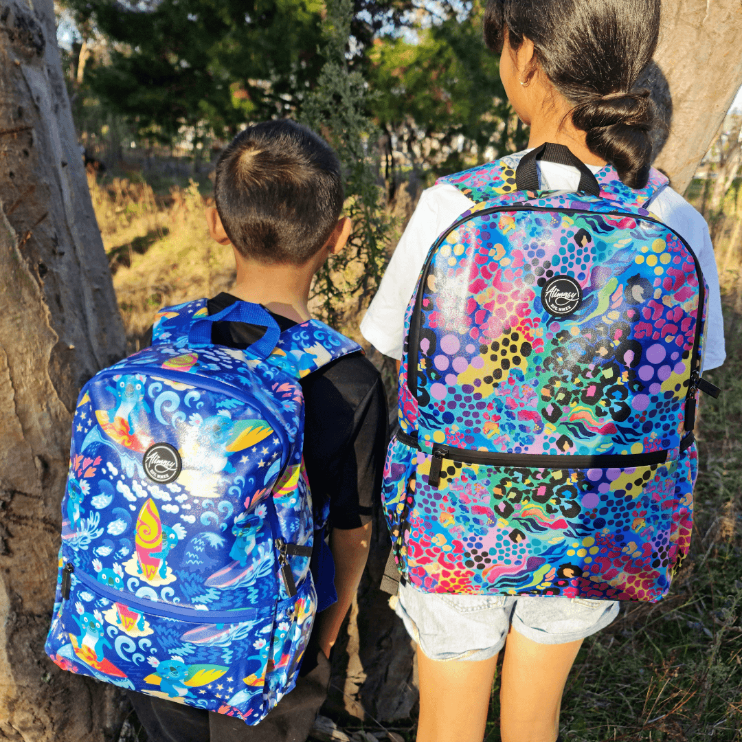 waterproof kids backpacks in surf koala design and electric leopard print by kasey rainbow. 100% waterproof inside and outside bag which is perfect for a swim bag, sports bag or travel bag.