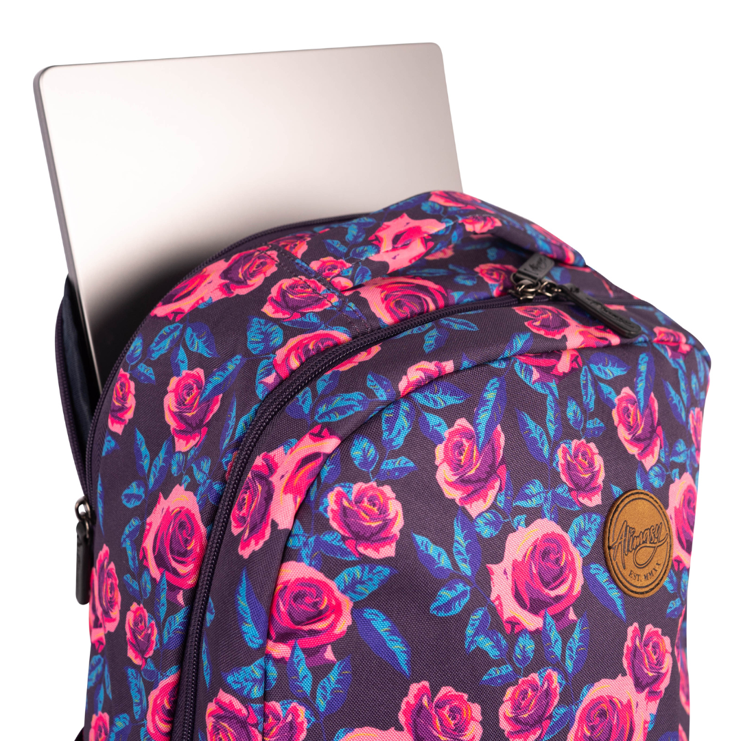 alimasy ladies laptop backpack with pink roses on dark purple background and laptop sticking out of pocket