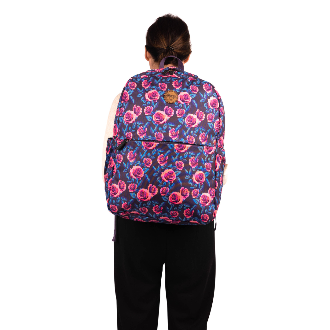 female model wearing alimasy neon roses laptop backpack with purple background